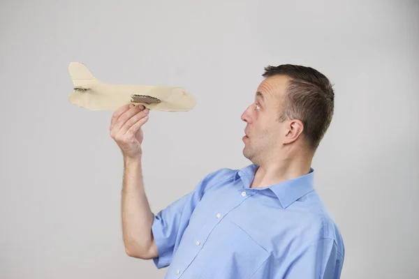 Fly Fear Metaphor Aerophobia Concept Business Man Holding Airplane Hand — Stock Photo, Image