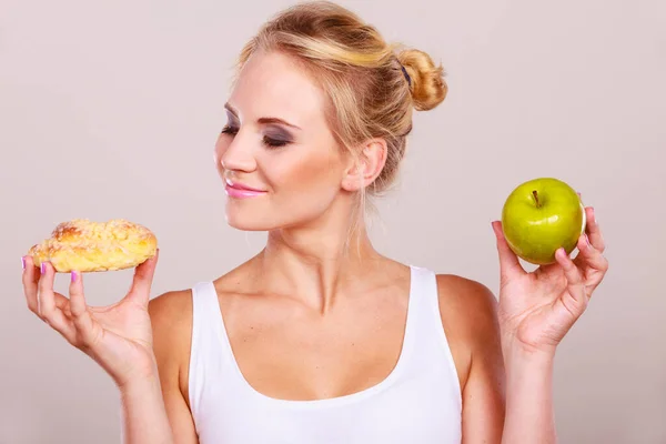 Woman Holds Hand Cake Sweet Bun Apple Fruit Choosing Trying — Stock Photo, Image