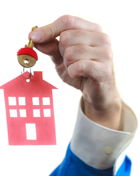 Closeup Male Hand Holding New House Key Red Home Shape — Stock Photo, Image