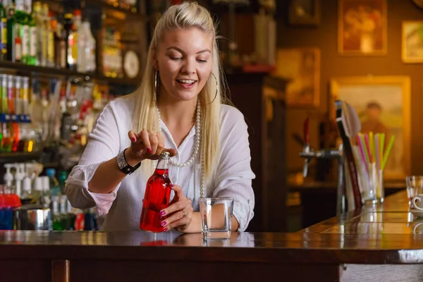 Woman Working Bar Counter Holding Red Bottle Lemonade — Stock Photo, Image