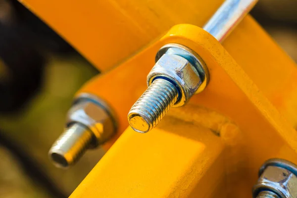 Baumaschinenkonzept Detaillierte Nahaufnahme Von Schrauben Und Bolzen Gelben Druckmaschinen — Stockfoto