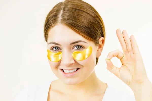Young Woman Applying Mask Golden Collagen Patches Eyes Girl Smiling — Stock Photo, Image
