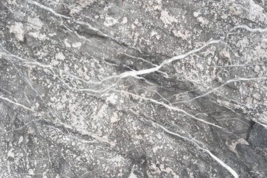 Arka plan ve doku, siyah taş ve beyaz çizgili. Desen çizgi kaya