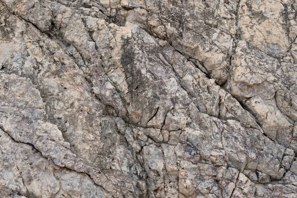 arka plan ve taş dokusuna erozyona uğramış su kırık ile vurmak