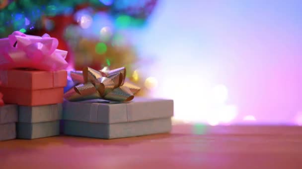 Close Gift Bow Flowers Place Wooden Table Blinker Light Backgrounds — Stock Video