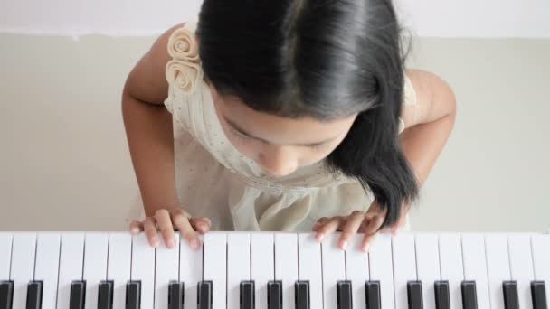 Top View Girl Wearing White Dress Playing Piano — Stock Video