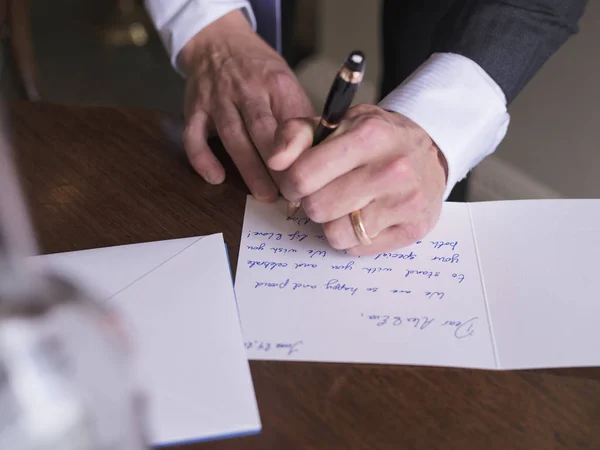 stock image Man writing card