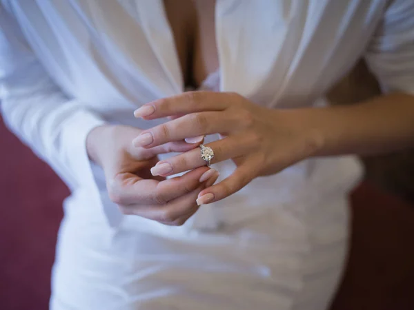 Brides ring on the finger