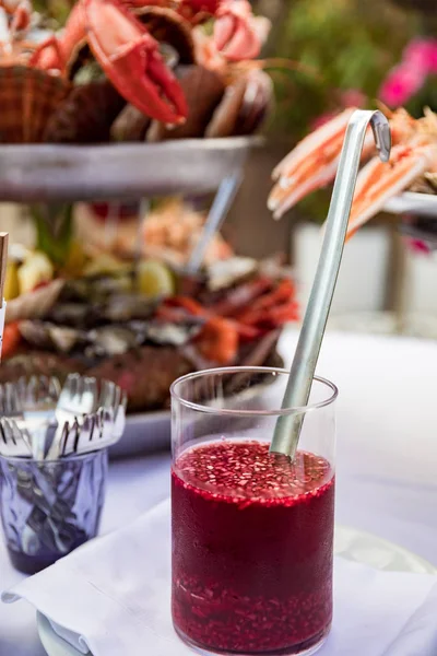 Pomegranate punch in decanter — Stock Photo, Image