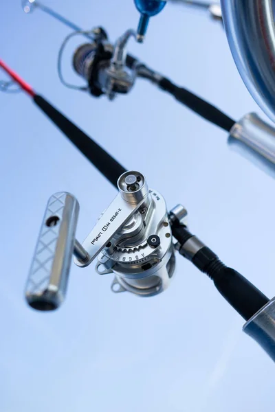 Closeup on fisherman rod on the ocean coast background — Stock Photo, Image