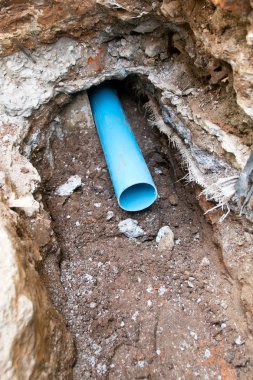 Repair the broken pipe in underground  clipart