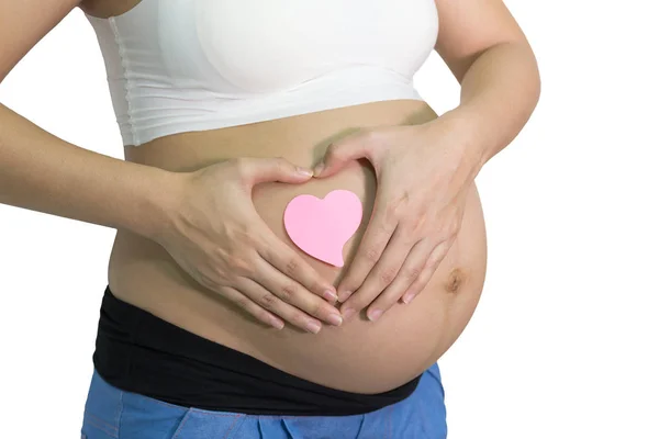 Mujer Embarazada Corazón Las Manos Alrededor Nota Papel Rosa Vientre — Foto de Stock