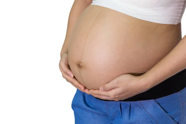 妊娠中の女性 週間の両手の白い背景に 健康概念と腹 — ストック写真