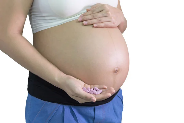 孕妇40周内手拿钙维生素药物 孤立的白色背景 健康的概念 选择重点 — 图库照片
