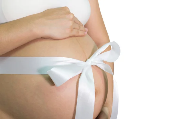 Embarazadas Manos Mujer Sosteniendo Vientre Con Regalo Cinta Blanca Vientre — Foto de Stock