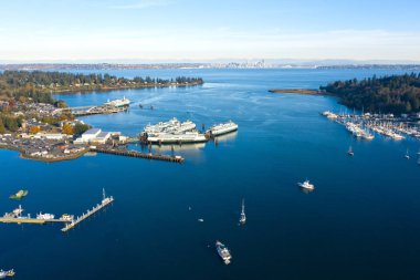 Bainbridge Island Winslow Waterfront Eagle Harbor Drone Aerial View Seattle Washington Skyline Sunny Day clipart