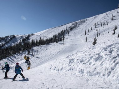 People Skiing at Schweitzer Mountain Ski Resort clipart
