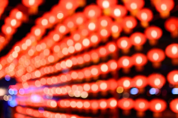 Red Tone Blur Bokeh Light Defocused Background — Stock Photo, Image