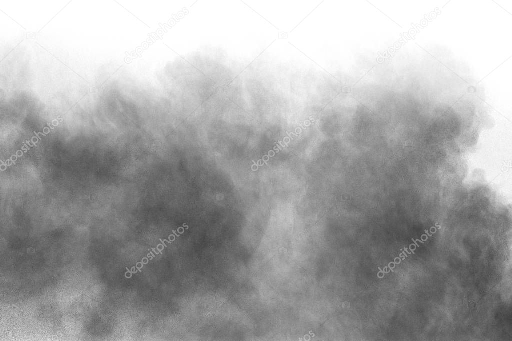 White powder explosion isolated on black background. White dust 