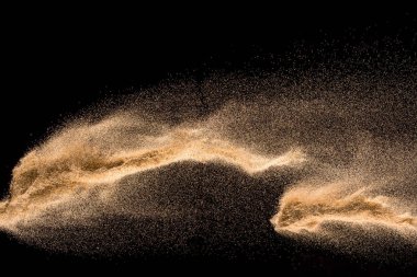 Kuru dere kum patlama. Altın renkli kum sıçrama bl karşı
