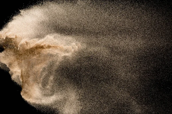 Abstrakte Sandwolke Goldfarbener Sand Vor Schwarzem Hintergrund — Stockfoto