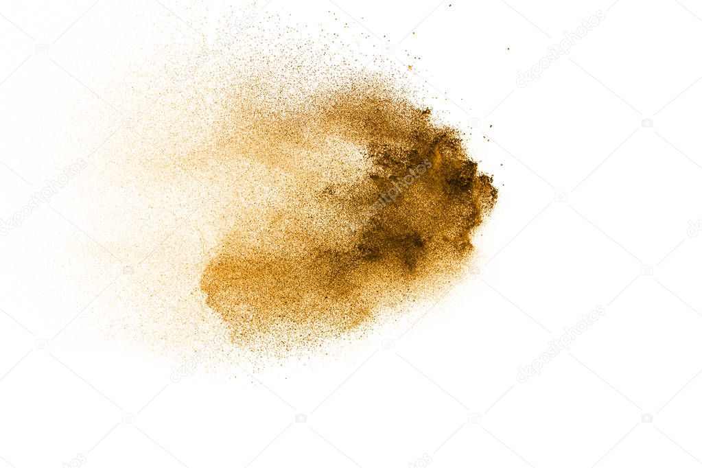 Freeze motion of brown dust explosion. Stopping the movement of brown powder.
