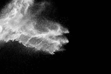 Bizarre forms of white powder explosion cloud against black background.White dust particles splash. clipart