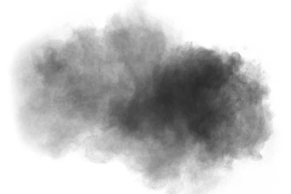 白を背景にした黒色火薬爆発 黒い塵の粒子が飛び散る — ストック写真