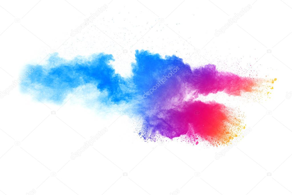 The explosion of colorful holi powder. The cloud of glowing color powder on white background.