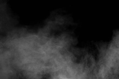 Beyaz toz patlaması bulutları. Siyah zemin üzerinde beyaz toz parçacıklarının hareketsiz durması..