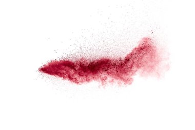 Kırmızı toz parçacıkları beyaz arka planda patlayıcı. Kırmızı toz sıçraması..