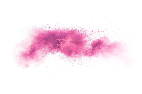 Explosion of pink colored powder isolated on white background.