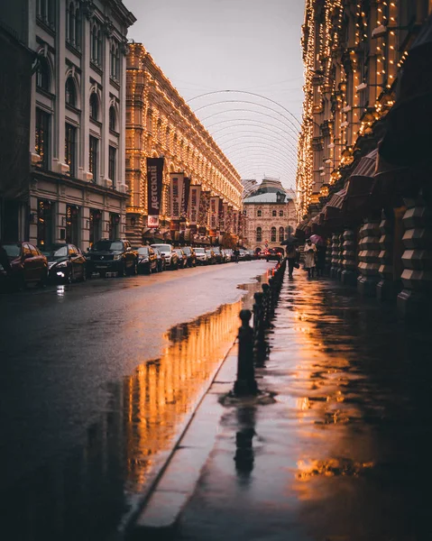 View Street Illuminated Buildings Reflecting Puddle — Stock Photo, Image