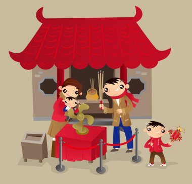 Hong Kong aile Çin yeni yılı festival sırasında Çin tapınağa gitmek. Nimet uğur Çarkıfelek fan kanatlı önümüzdeki yıl dönüm.