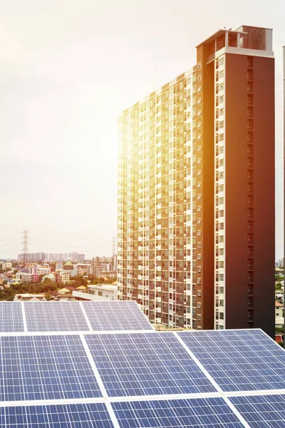 Renewable energy is a necessity of the future world,Golden light, Solar Cell Future Energy, Big Solar Cell The backdrop is a modern and elegant condo.