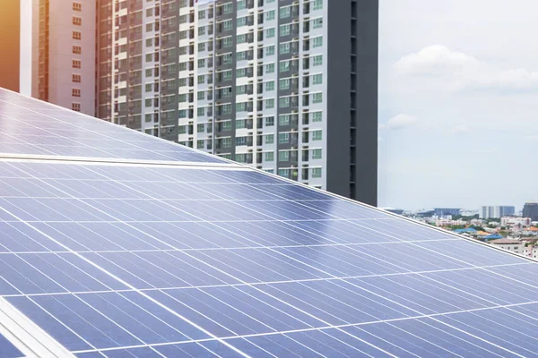 Renewable energy is a necessity of the future world,Golden light, Solar Cell Future Energy, Big Solar Cell The backdrop is a modern and elegant condo.