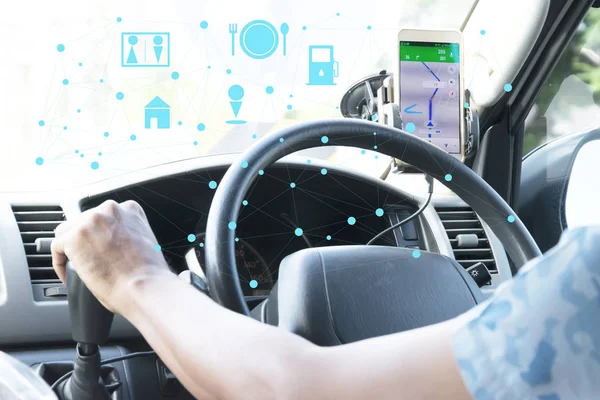 Smart transportation concept. Sharing economy and collaborative consumption. Car , train and GPS icons connected together against abstract city street light background,Close-up of gps navigation system In car.