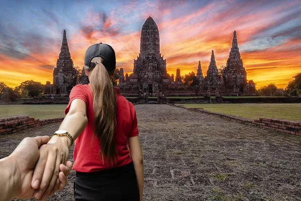 Lover women and men asians travel relax in the holiday.Wat Chai-wat-tha-na Ram The old temple is located at Ban Phra, Amphur Muang, Phra Nakhon Si Ayutthaya. is nourishing, morning light.