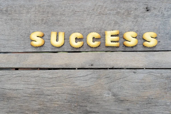 Put cookies into words that are success. — Stock Photo, Image