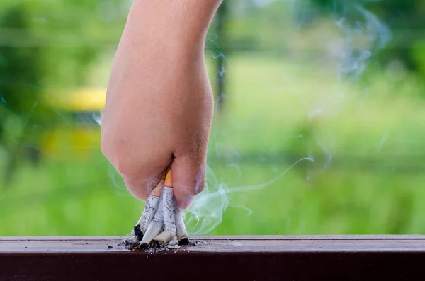 World No Tobacco Day Men cigarette break And send a cigarette