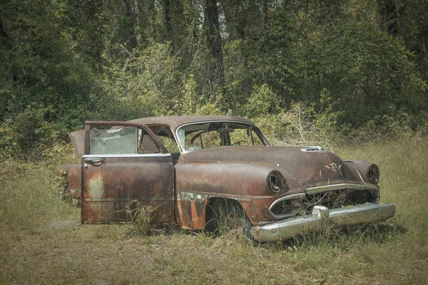 Roadside rusted old trucks and cars in Florida Stock Picture