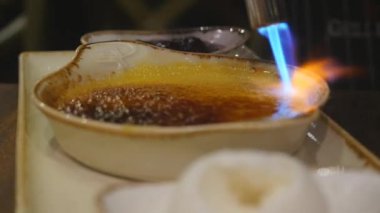 Creme Brulee caramelizing garson