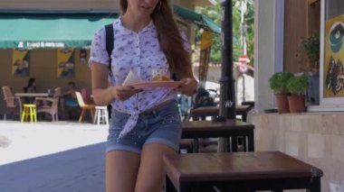 Young woman sitting in a traditional asian cafe
