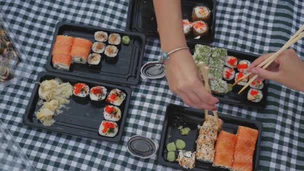 Overhead View of sushi eating — Stock Video