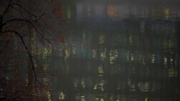 Reflection in the river water of cityscape — Stock Video