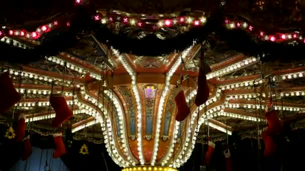 Iluminated carousel at night — Stock video