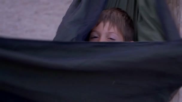 Funny child in hammock — Stock Video