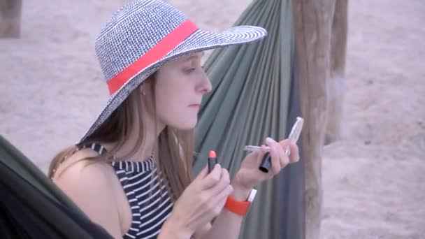 Young woman resting on hammock — Stock Video