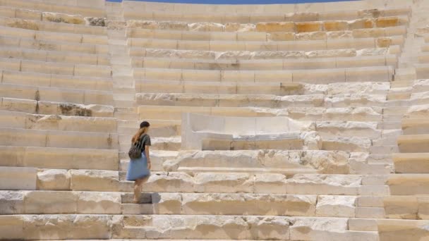 Young pretty girl in an ancient greek theater — 비디오