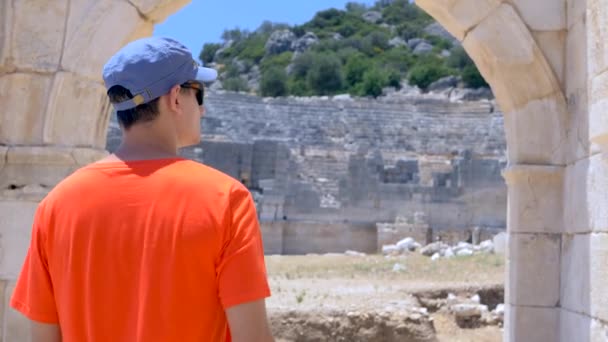 Young man in ancient Agora — Stockvideo
